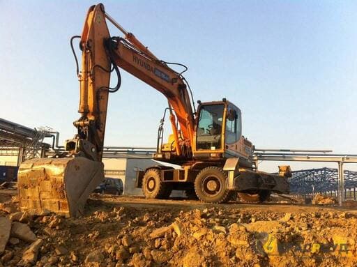 «Hyundai R180» компания «Красроуд» - миниатюра Аренда колесного экскаватора с водителем «Hyundai R180» компания «Красроуд»